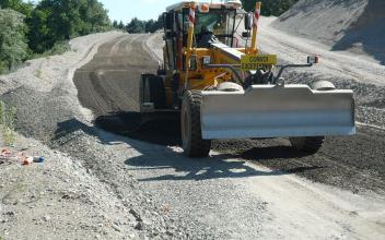 Roller-compacted concrete for safe roads